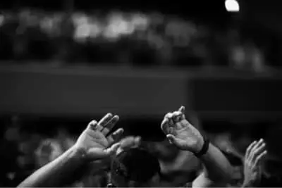 hands in the air to illustrate worship