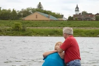 Man baptizing someone in water